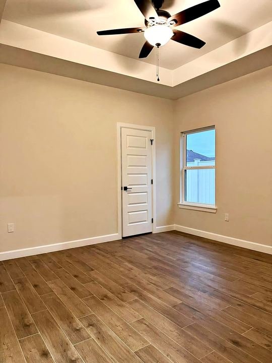 Wood-look porcelain tile floor installed by Elyon Floors