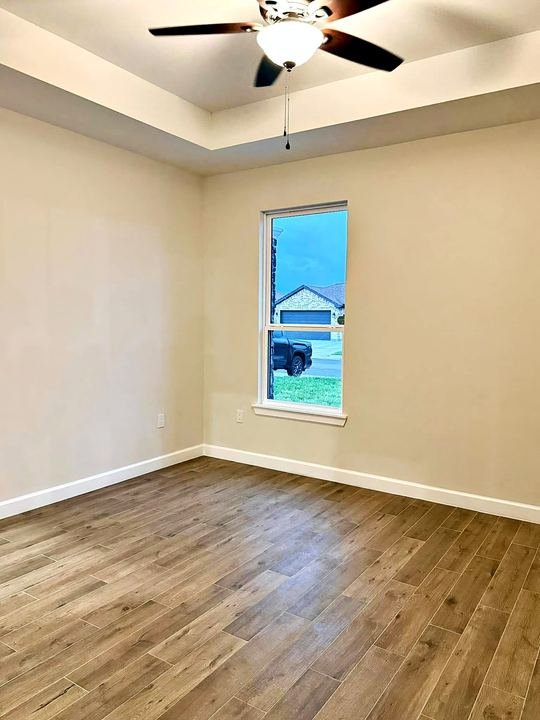 Wood-look porcelain tile floor installed by Elyon Floors