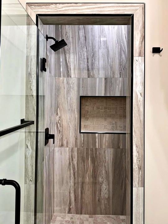 Custom tile shower installed by Elyon Floors