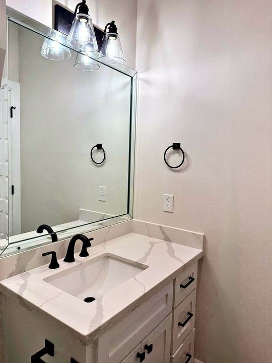 Bathroom remodel with quartz vanity top