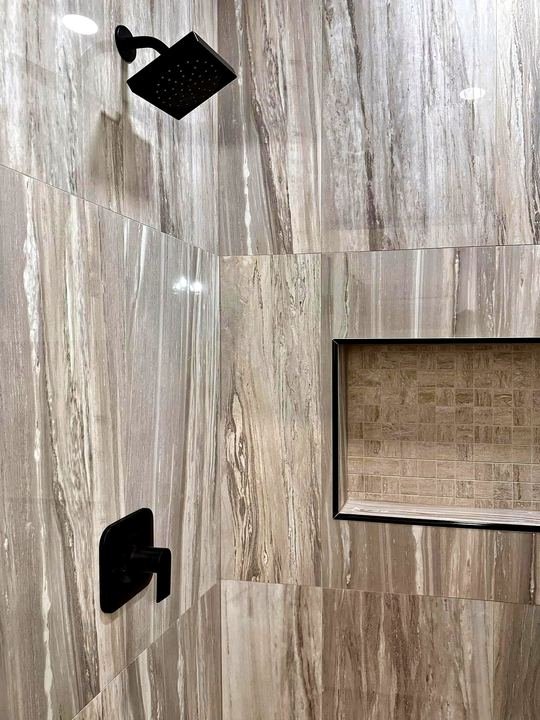 Custom tile shower installed by Elyon Floors