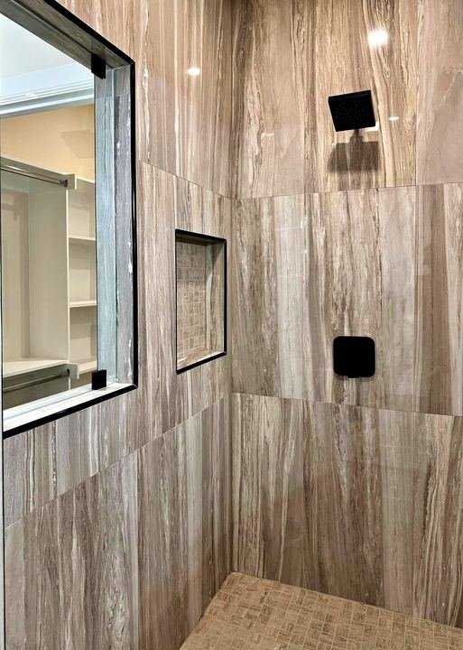 Custom tile shower installed by Elyon Floors