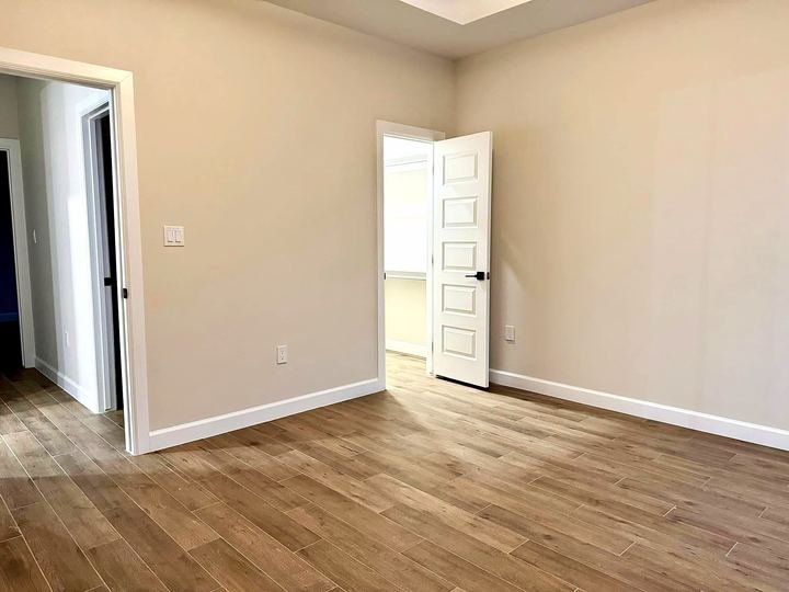 Wood-look porcelain tile floor installed by Elyon Floors