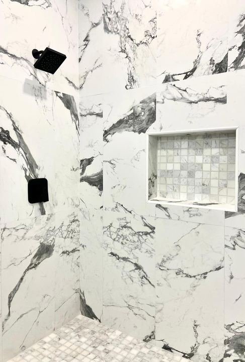 Custom tile shower installed by Elyon Floors