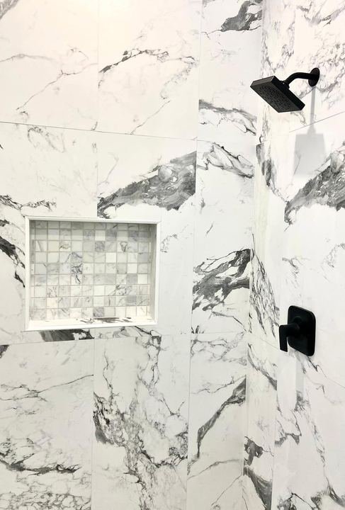Custom tile shower installed by Elyon Floors
